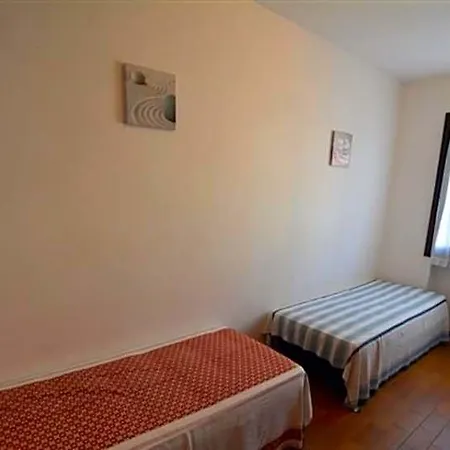 Large Row House With Private Fenced Garden For 10 Guests In Lignano Pineta Lignano Sabbiadoro