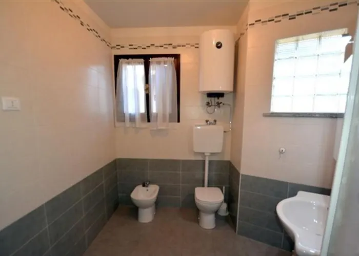 Large Row House With Private Fenced Garden For 10 Guests In Lignano Pineta 4* 利尼亚诺萨比亚多罗